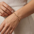 bracelet tulipe fleuri doré en acier inoxydable avec pierres nude rosées